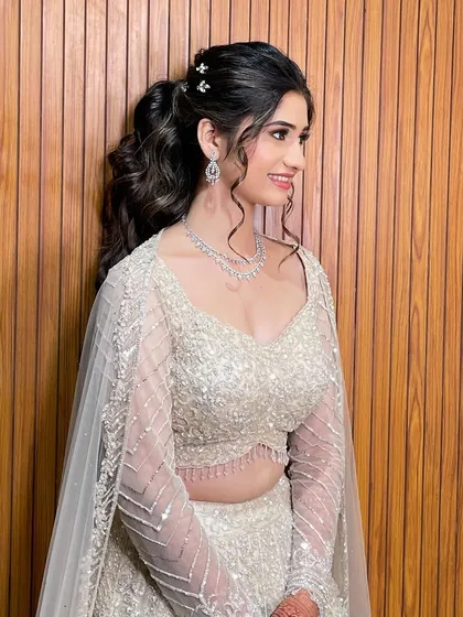A portrait of the Sangeet bride, her ponytail looking chic and stylish.
