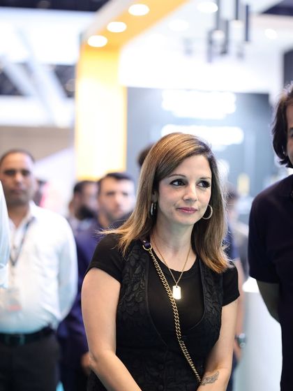 A candid shot of Sussanne Khan as she takes in the sights and sounds of the bustling Smart Home Expo.