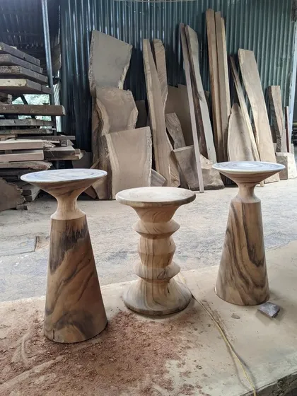 The collection of sculptural side tables.