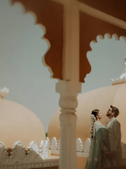 A majestic portrait using the location's unique architecture. I framed the couple against the domes of the palace, creating a sense of grandeur and timeless romance.