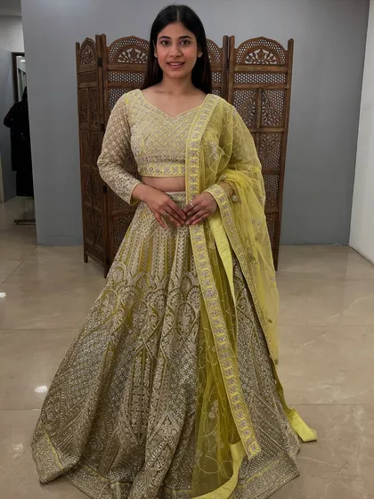 The full look of this elegant and sunny yellow lehenga, perfect for a happy occasion.