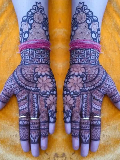 A beautiful design with floral motifs and intricate check patterns.