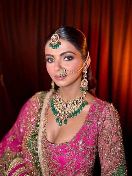A final portrait from this shoot, capturing the complete royal bridal look. The makeup is designed to be timeless and elegant.