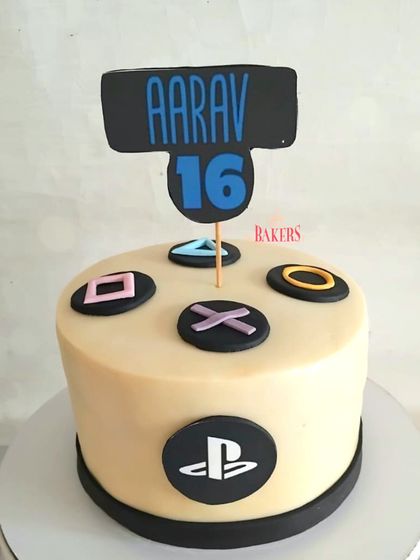 The ultimate PS5 cake for a gamer! I made this PlayStation-themed cake for Aarav's 16th birthday. It's a no-fondant design featuring the iconic controller buttons, perfect for any PlayStation fan.