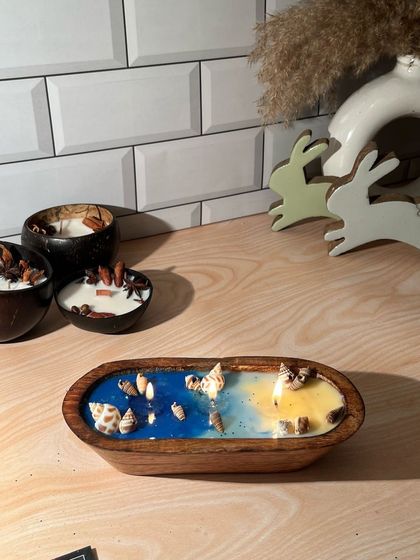 My beach-themed candle in a wooden boat was a bestseller in March. It's a perfect piece of coastal decor that brings a vacation vibe to your home.