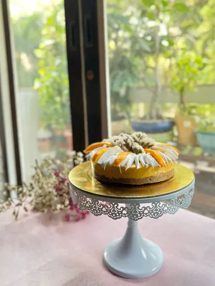 Our Mango Cheesecake is the taste of Indian summer. A creamy, rich cheesecake base is topped with a vibrant mango puree and fresh mango slices, sitting on a delicious biscuit crust.