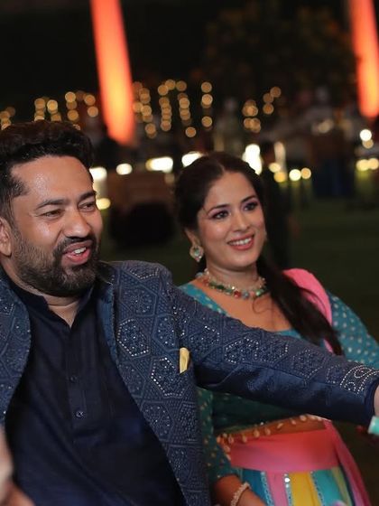 Even I couldn't resist joining the crowd for a dance. Here I am enjoying the Dandiya Raas with the guests at the event.