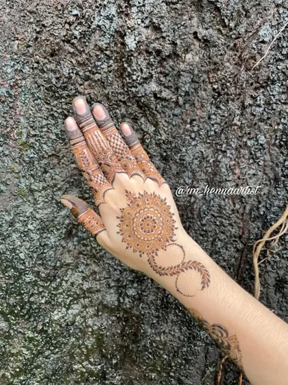 Another shot of this mandala design, this time against a textured rock background. The contrast of soft art and hard nature is beautiful.