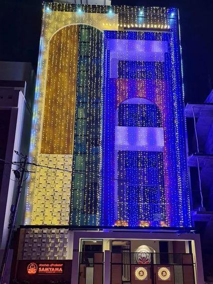 The fully inaugurated Spiritual Centre building lit up at night. A duplicate of ID 4, this image serves as a powerful symbol of our established presence and mission.