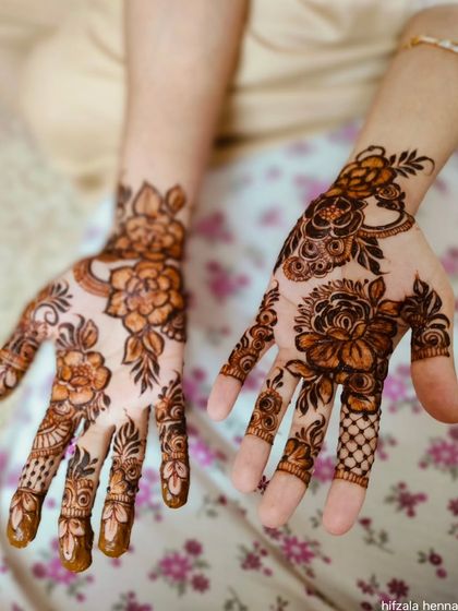 A beautiful floral design for a happy client from Dubai, featuring delicate flowers and leaves.