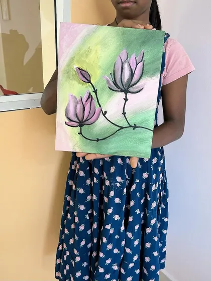 Look at the beautiful blending and delicate details in this acrylic flower painting. In my classes, we learn techniques like this on canvas, turning a simple idea into a wonderful piece of art.
