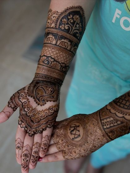 One hand features a classic paisley, while the other has a personalized monogram, offering the best of both worlds.