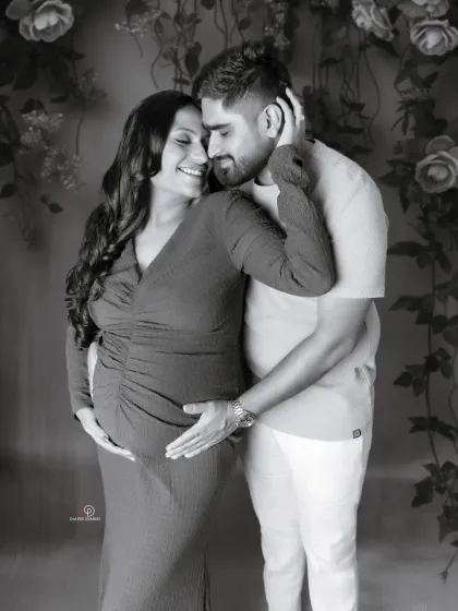 The same loving moment, presented in timeless black and white. Monochrome photos often bring out the raw emotion and connection in a portrait.