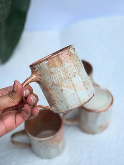 Another angle of our Shino coffee cup. Mahanth fell in love with this glaze after our first test, and we immediately made a huge batch.