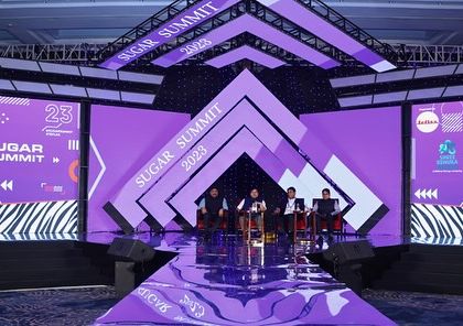 A view from the stage of the 'Sugar Summit.' The dynamic design and advanced AV setup created an engaging and memorable experience for the panelists and the large audience.