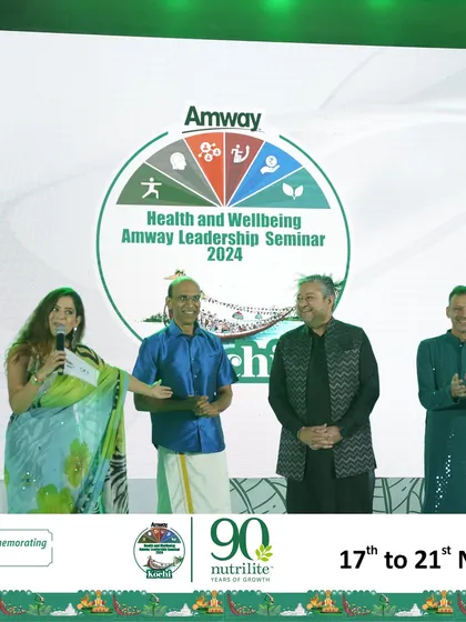 On stage with the leadership team at the Amway event.