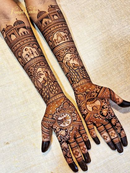 A beautiful bridal design without human figures, featuring intricate peacock and lotus motifs on the palms and traditional patterns on the arms.
