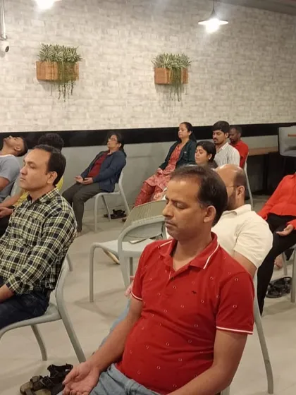 We bring the benefits of yoga directly to your workplace. This is from a corporate wellness session where we guided employees through chair yoga and relaxation techniques to help them de-stress and find a moment of calm during their busy day. A healthy team is a productive team.