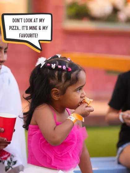 That moment when the pizza is just too good to share. It's not just about play; we make sure our food is a highlight for the kids too.