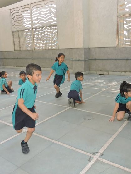 Students engaged in a game of Kho-Kho, a traditional sport that builds speed, agility, and strategic thinking among teammates.