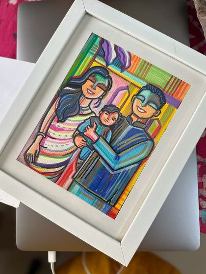 A framed family portrait done with vibrant acrylic pens. I love the fusion of my line art style with these bold colors to create a modern heirloom.