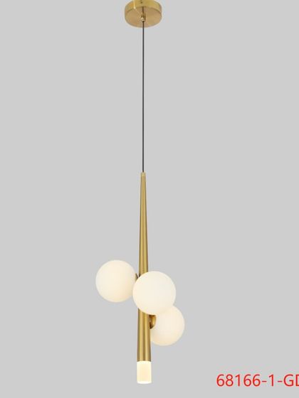 A modern pendant featuring a cluster of three frosted globes on a brass stem. It's a chic and minimalist option for any space.