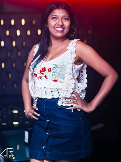 A guest posing at the bar.