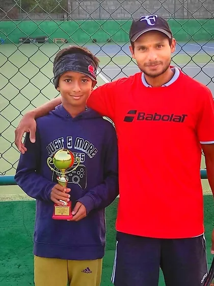 We are incredibly proud of our players' success. Here I am with our student Likith S Gowda after he secured a runner-up position in the U-12 AITA Champion Series tournament.
