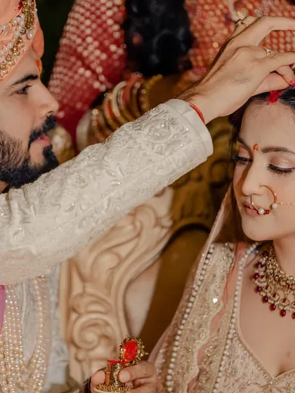 A close-up of a traditional wedding ritual. I can perform soft, instrumental, or devotional music that adds a layer of grace and sanctity to the wedding ceremony itself.