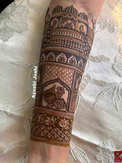 Another view of the full arm design, highlighting the intricate details and the flow of the patterns.
