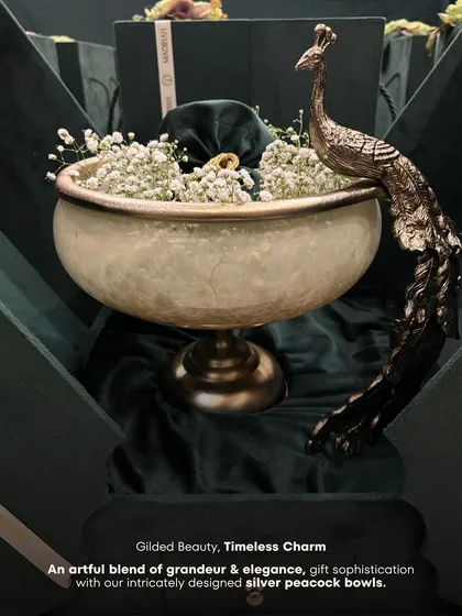 The peacock is a symbol of grace and heritage in our culture. My silver peacock bowls are crafted to be more than just serveware; they are statement pieces. This is an example of gilded beauty and timeless charm, designed to add a regal touch to any home or celebration.