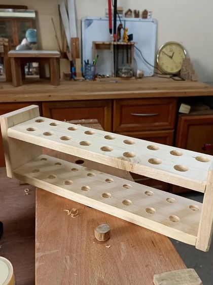 A test tube-style planter or stationery holder, built by a student from the Lisaa School of Design. It's a simple but very creative and functional piece.