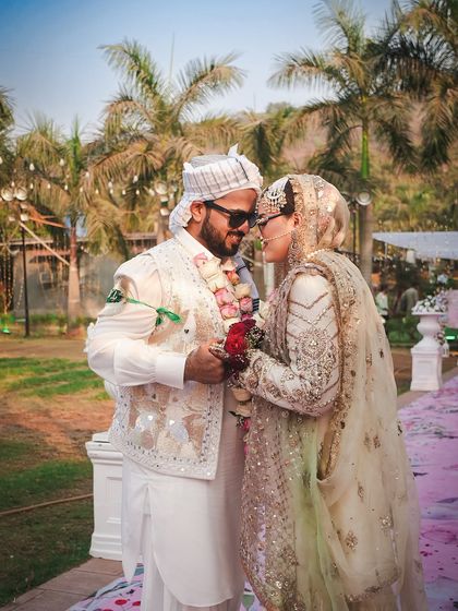 This candid photo captures a sweet, intimate moment between the couple after their Nikah ceremony. We look for these unposed interactions that radiate pure love and happiness, making your wedding album feel truly personal.