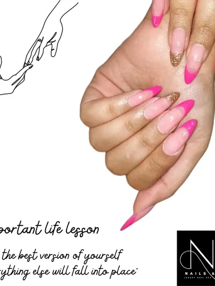 A long, dramatic v-french or chevron-style manicure. This set features extra-long stiletto nails with a bright pink tip and a gold glitter accent nail.