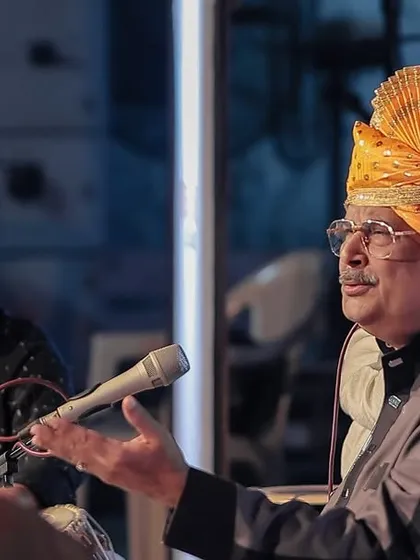 A gallery of cherished moments accompanying the legendary vocalist, Guruji Padma Bhushan Pandit Ajoy Chakraborty ji, at various prestigious festivals.