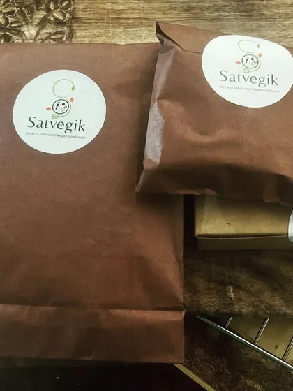 Today's delivery lineup, featuring my hearty flourless lentil bread and almond walnut nutritional bars. Each order is packed with care, ensuring you receive the freshest products.