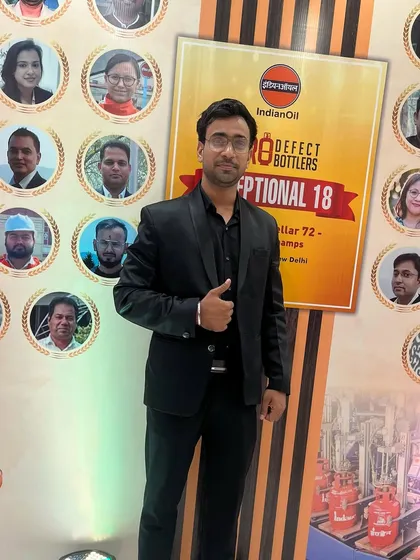 Posing next to the "Exceptional 18" wall of fame at the IndianOil event.