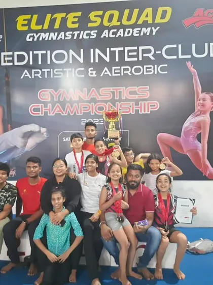 A large group photo of our winners, coaches, and parents after a successful inter-club championship. It takes a village to raise a champion.