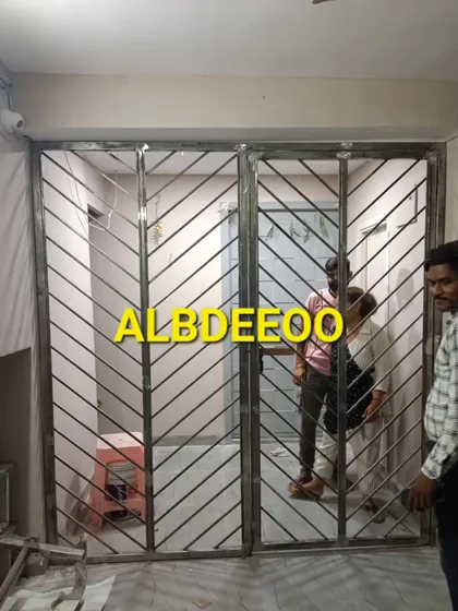 A modern mild steel main door with a chevron pattern. This is a secure and stylish option that we can fabricate for both our prefab structures and traditional homes.