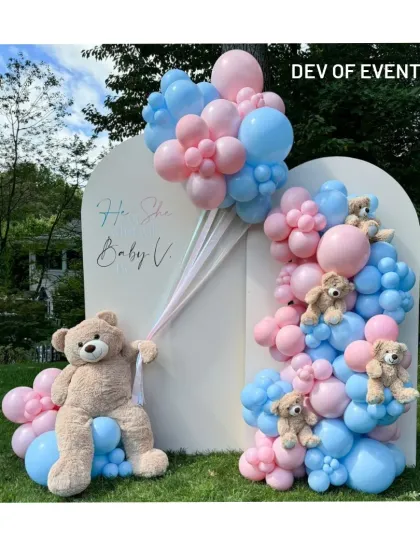 Celebrating a new arrival with a classic "He or She" baby shower theme. I designed this outdoor backdrop using pink and blue organic balloon garlands and adorable teddy bears, including a life-sized one, to create the perfect sweet and playful atmosphere.