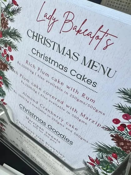 A little look at my Christmas menu from a recent holiday bazaar. I offer my rich plum cake with or without marzipan, along with other goodies like marzipan sweets and Christmas tree brownies.