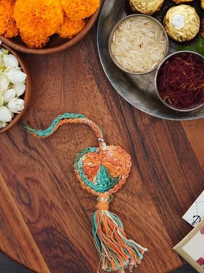 A styled shot of the orange and green Lumba on a festive platter. It's all about those beautiful, handcrafted details.