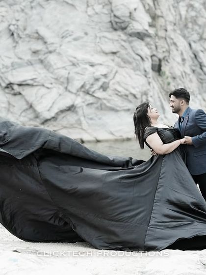 This collection showcases a variety of glamorous and cinematic pre-wedding concepts. It includes dramatic shots with flowing gowns against natural and studio backdrops, romantic moments on yachts and with vintage cars, and elegant portraits in luxurious, themed sets.