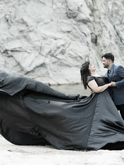 This collection showcases a variety of glamorous and cinematic pre-wedding concepts. It includes dramatic shots with flowing gowns against natural and studio backdrops, romantic moments on yachts and with vintage cars, and elegant portraits in luxurious, themed sets.