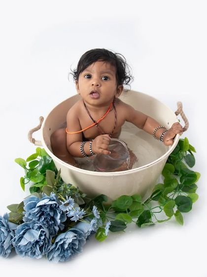 Another sweet moment from the minimalist bathtub shoot. These sessions are fantastic for toddlers who are always on the move, as the water keeps them happily engaged.