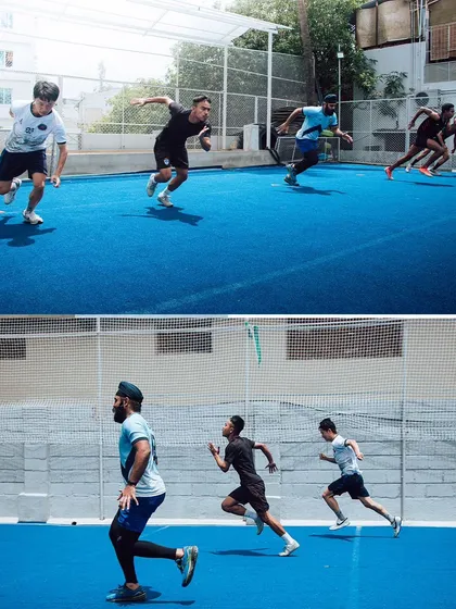 A group of athletes performing coordinated sprint drills on our turf. This image showcases the competitive and focused environment of our on-field sessions, where athletes push each other to get faster.