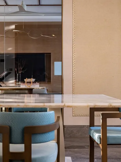 Another perspective of the curated console, showing its relationship with the adjacent dining area. The reflection in the mirror adds depth and a sense of continuity between the spaces.