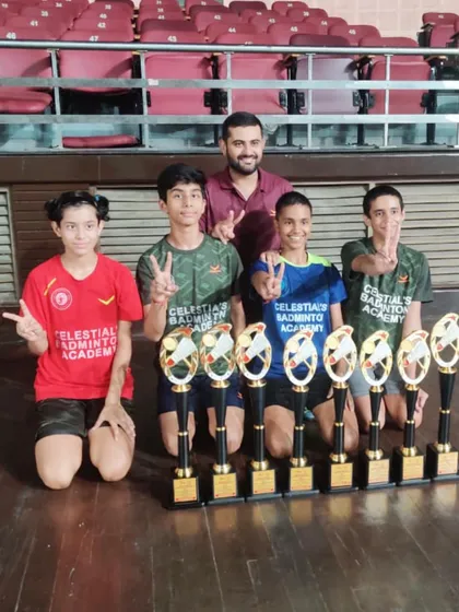 Our coach with the winning players from the Delhi State Championship, celebrating a massive haul of 9 medals for the academy.