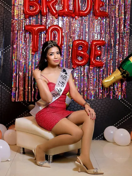 A chic portrait of the "Bride to Be" at her party. She looks confident and beautiful, ready for her next chapter.