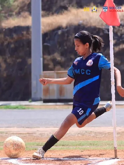 Prisha Patel preparing to take a corner kick during a crucial match. Set-piece execution is a vital part of our tactical training for competitive games.
